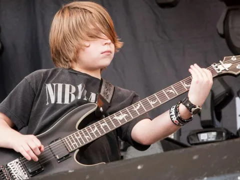 a person playing a guitar