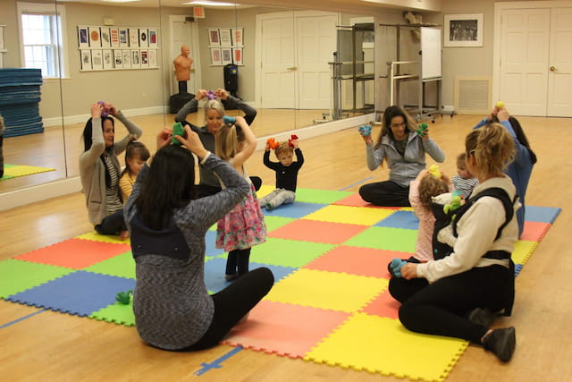 a group of people kneeling on the floor