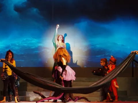 a group of people on a stage