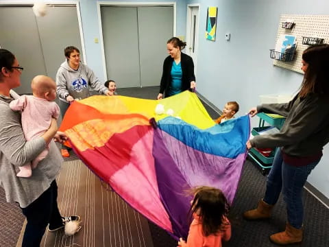 a group of people holding a flag