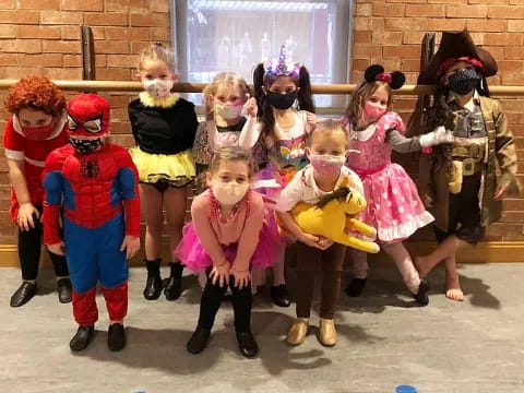 a group of children in clothing
