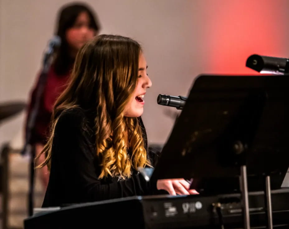 a person playing a piano