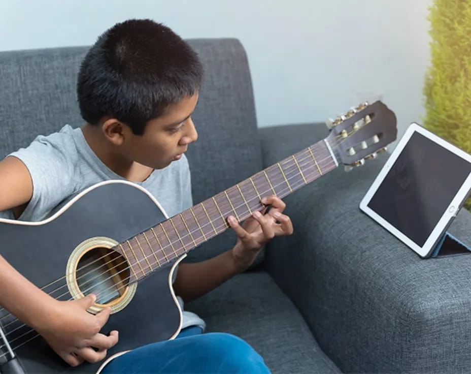 a person playing a guitar