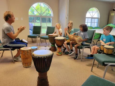 a group of people playing drums