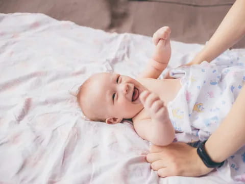 a baby lying on its back