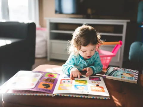 a child sitting at a table