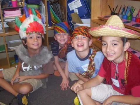 a group of children wearing hats