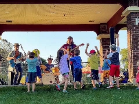 a group of people playing outside