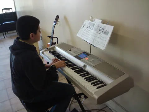 a person playing a piano