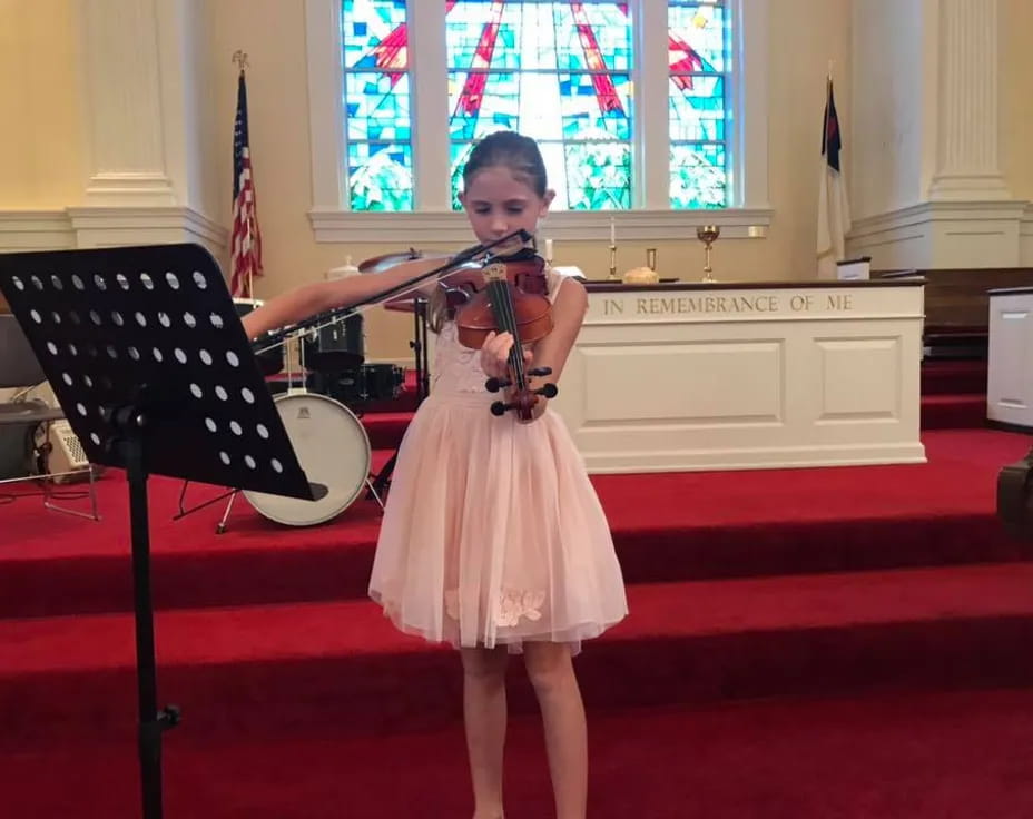 a girl playing the flute