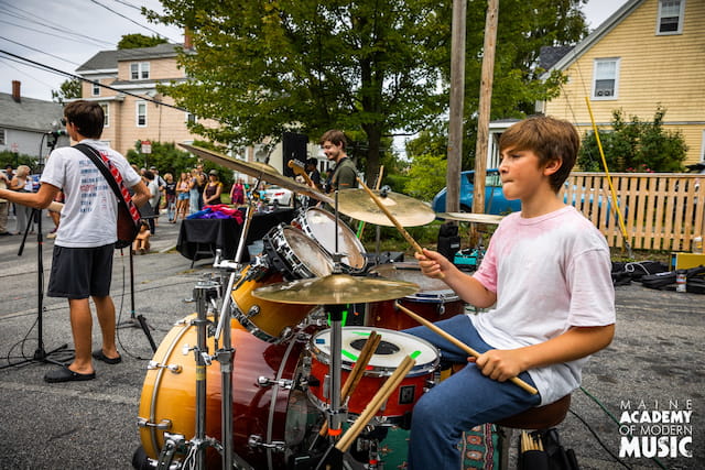 a group of people playing instruments