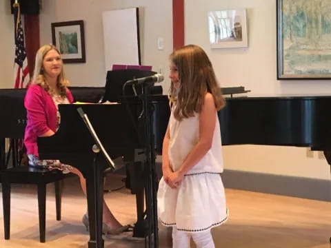 a person playing a piano