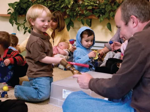 a person and a group of children