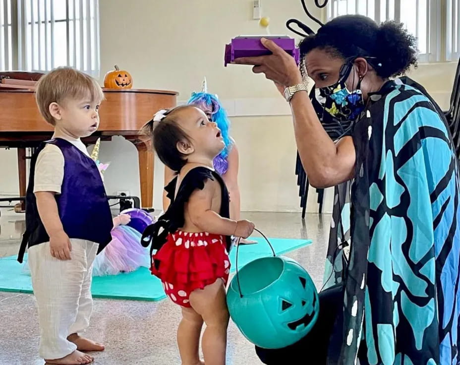 a person and children in a room