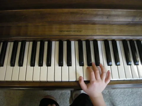 a person playing a piano