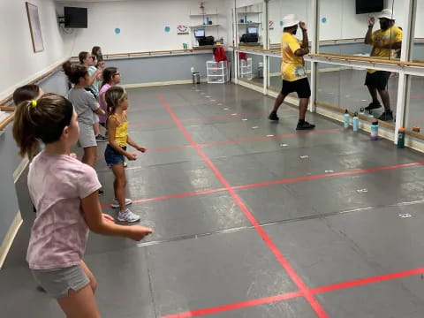 a group of people in a gym