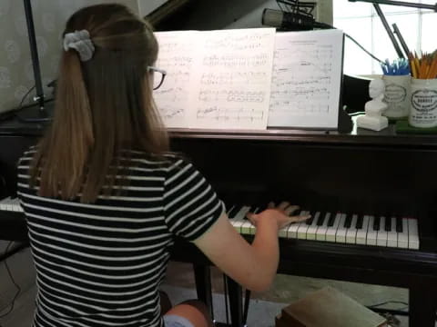 a person playing a piano