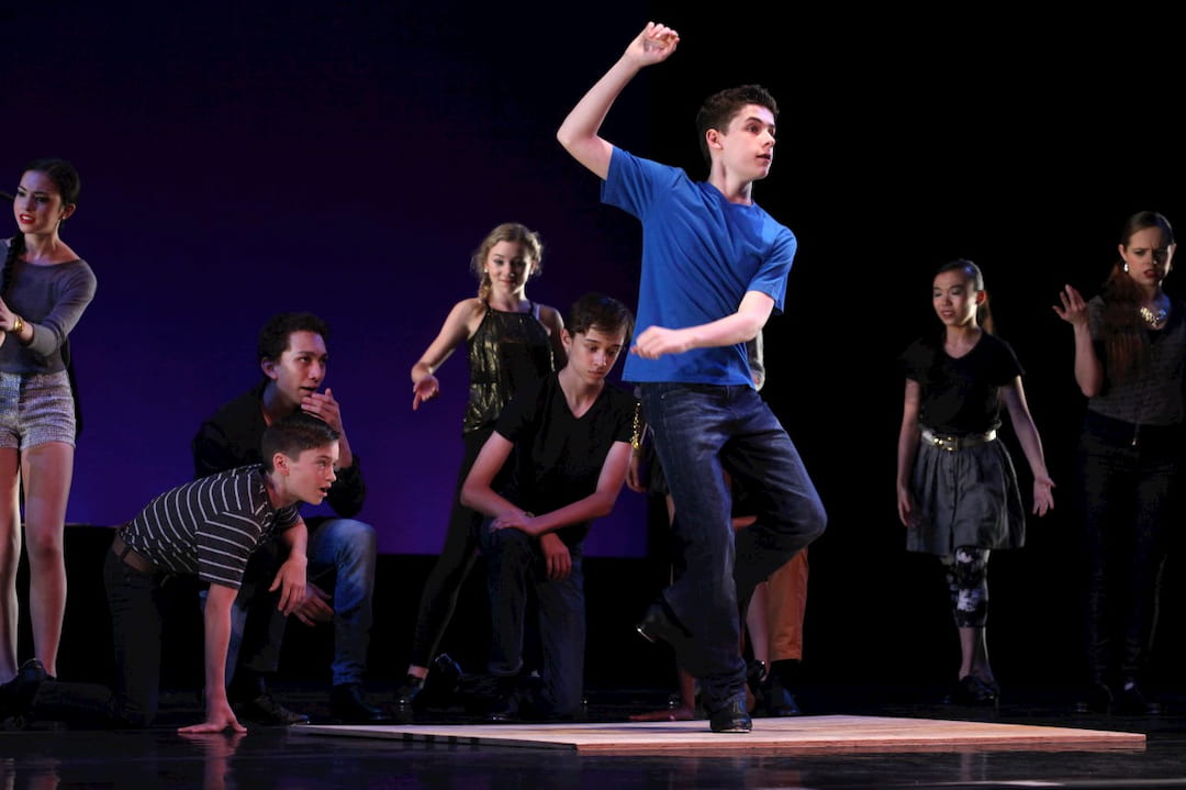 a group of people on a stage