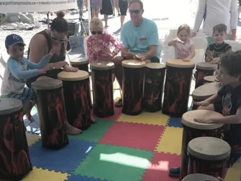 a group of people playing drums