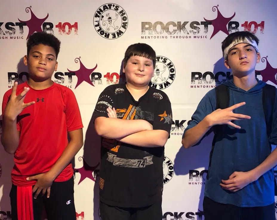a group of men posing for a picture