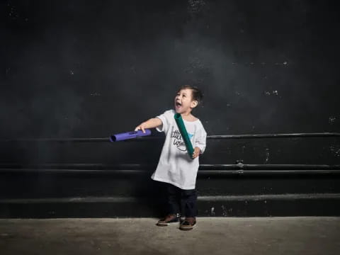 a boy holding a bat