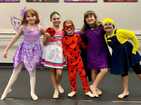 a group of girls wearing clothing
