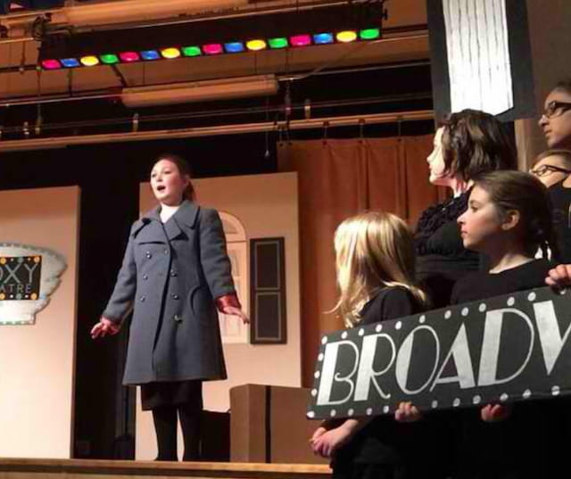 a group of people standing in a room