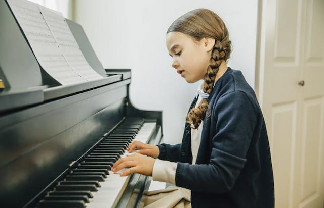 a person playing a piano