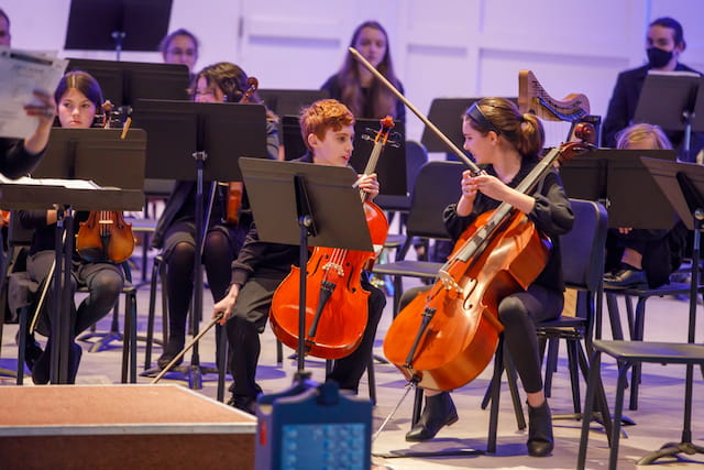 a group of people playing instruments