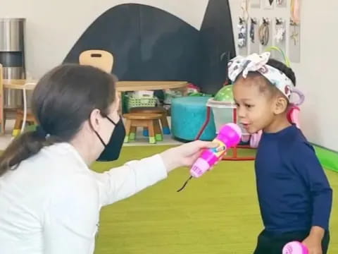 a person holding a baby