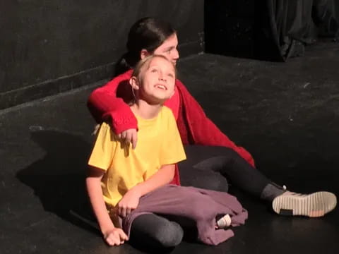 a person sitting on the ground