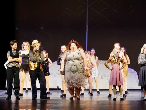 a group of people on a stage