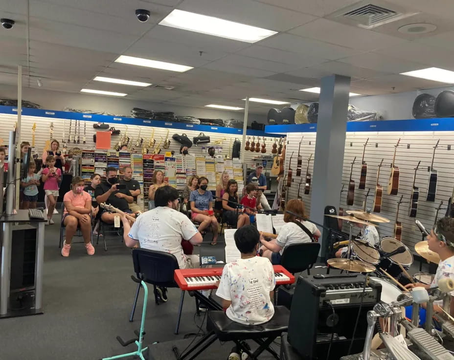a group of people sitting in a room