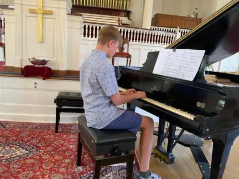 a person playing a piano