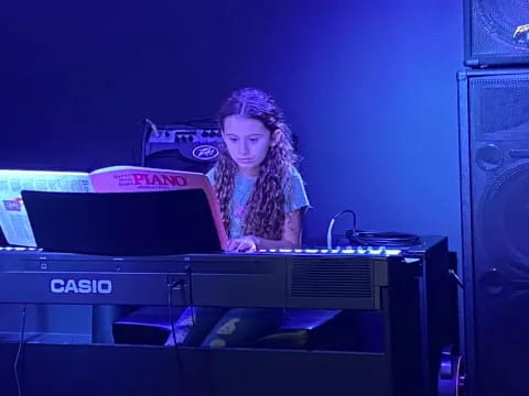 a person playing a piano