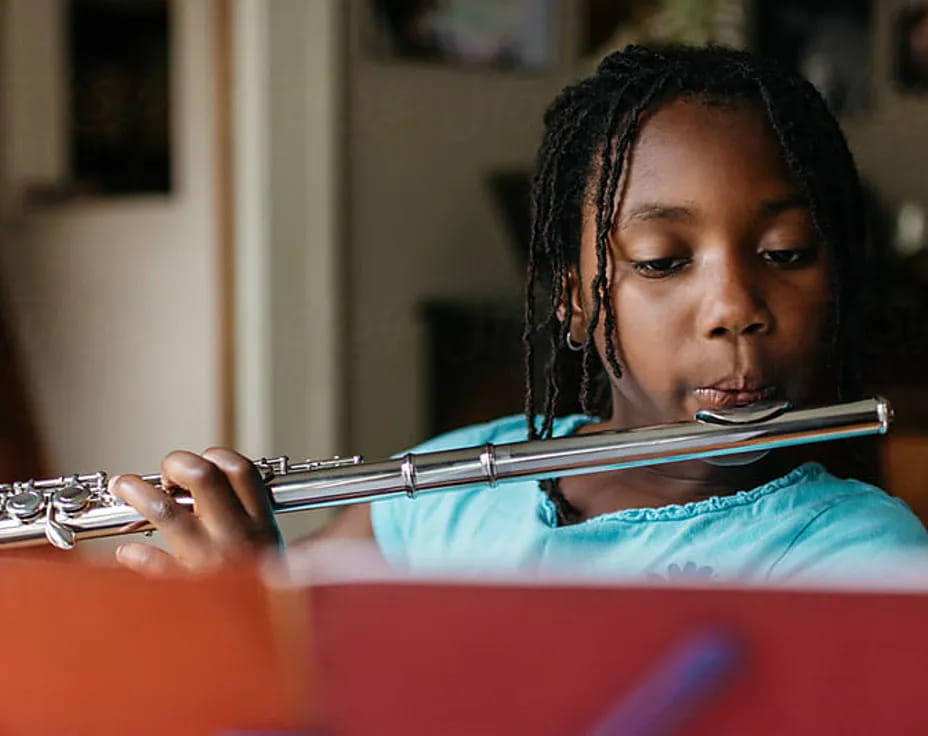 a person playing a trumpet
