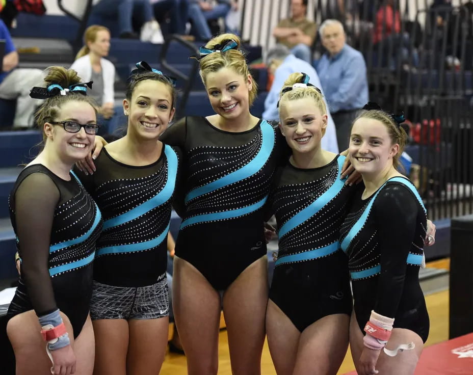 a group of women in a gym