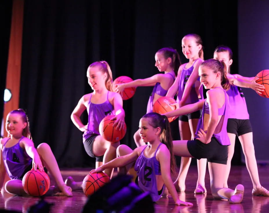 a group of girls in a gym