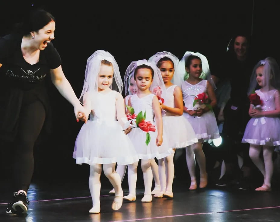 a group of girls on a stage