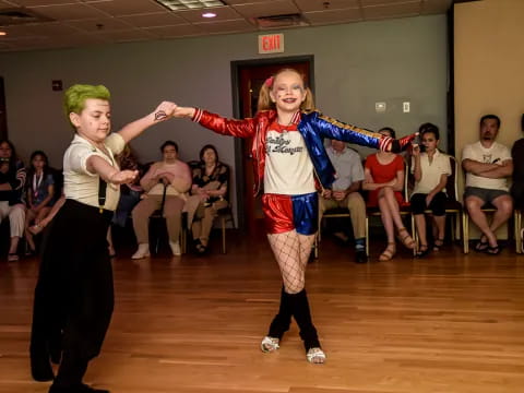 a couple of girls dancing