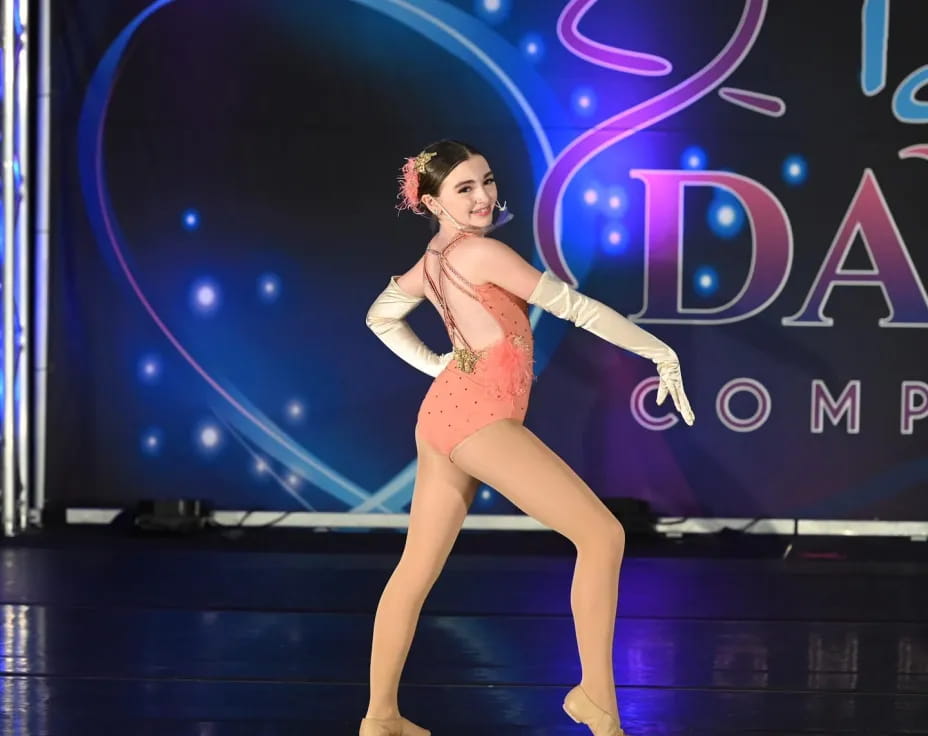a woman dancing on a stage