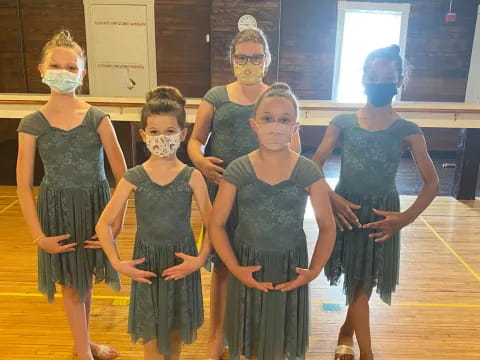 a group of girls wearing clothing