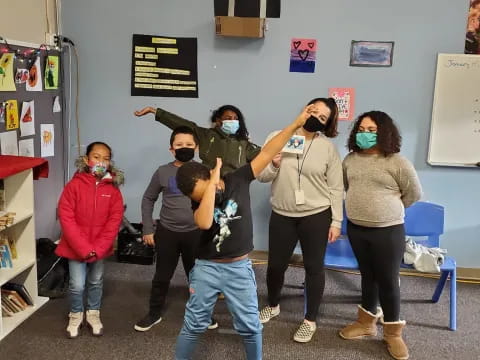a group of people wearing masks