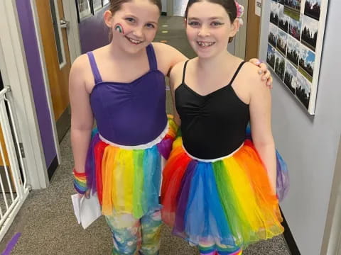 two girls wearing clothing