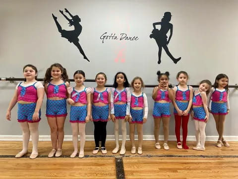 a group of girls in a line