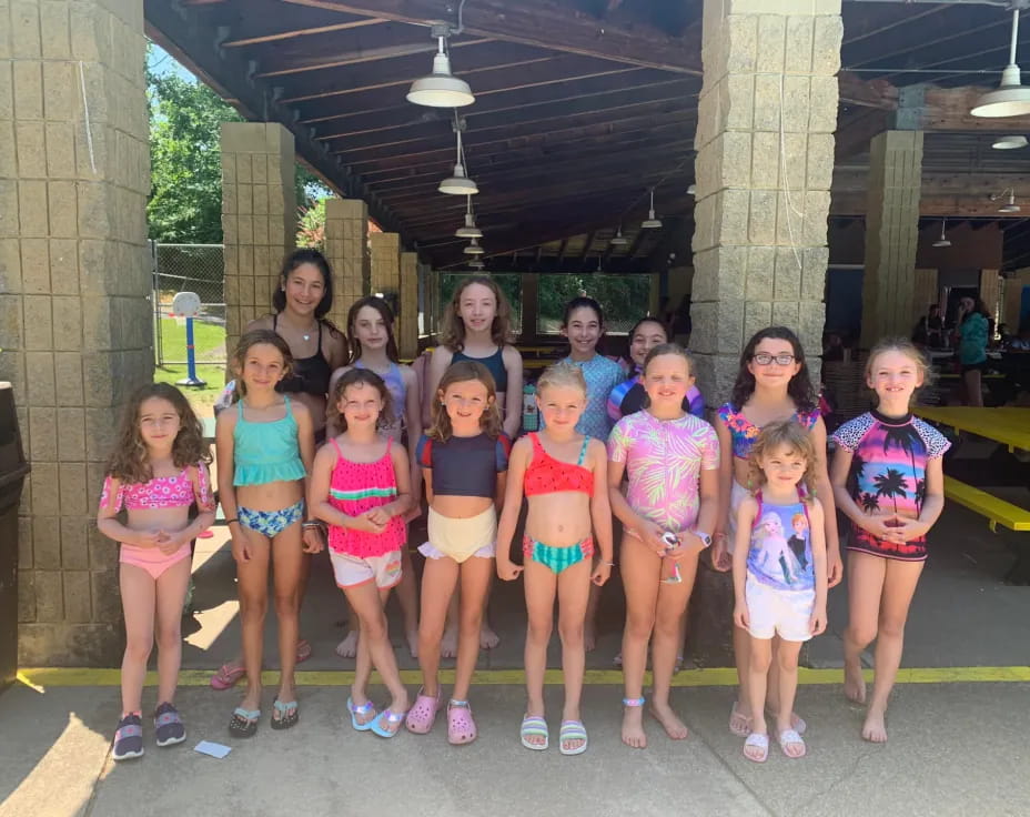 a group of girls posing for a photo