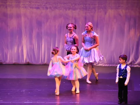 a group of children on a stage