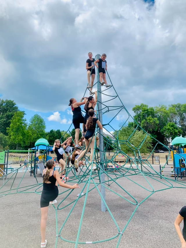 a group of people on a trampoline