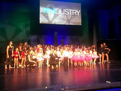 a group of people on a stage