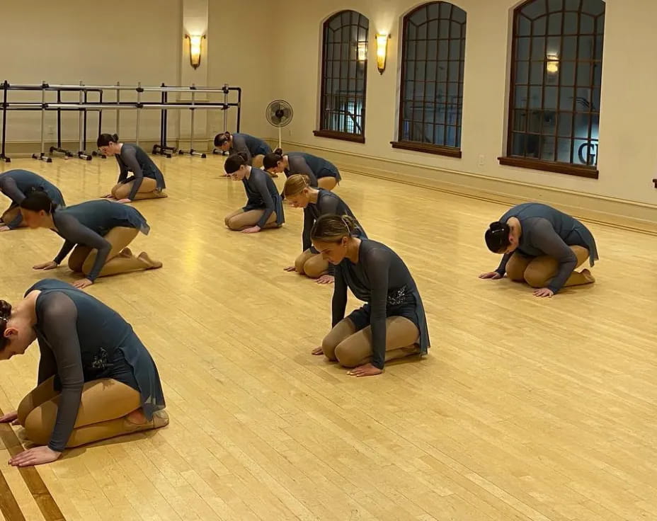 a group of people doing yoga
